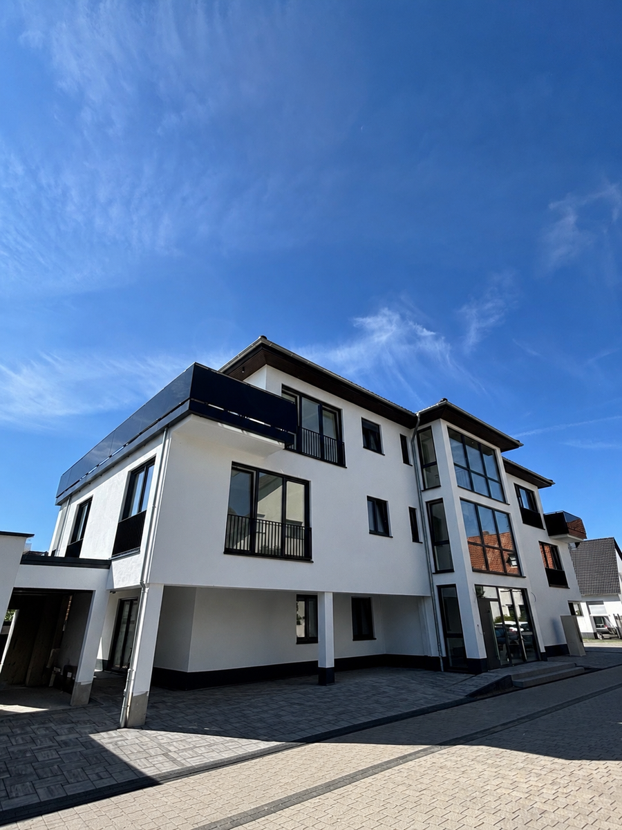 0b621f4b-85cf-4c97-81b9-6a570316e2b1 Luxus-Neubauwohnung mit PV-Anlage & niedrigen Energiekosten in TOP-LAGE