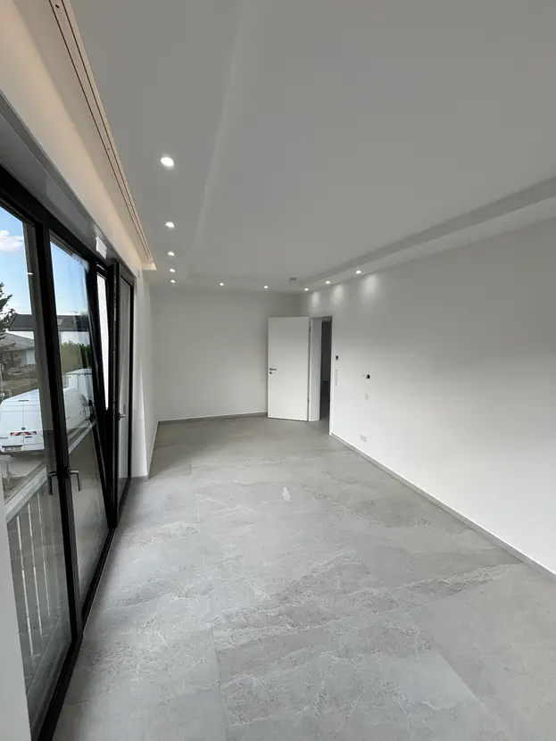 943fb7d3-e6dd-49da-b31e-5db8631d520f-2063315049 Luxus-Neubauwohnung mit PV-Anlage & niedrigen Energiekosten in TOP-LAGE